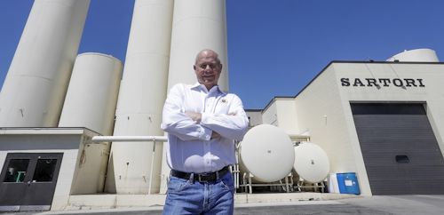 In this June 7, 2019, photo Jeff Schwager, president of Sartori Cheese poses for a picture at their plant in Plymouth, Wis. Image credit: AP Photo/Morry Gash