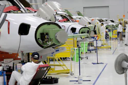 In this July 30, 2019, file photo people work in the production area at the Honda Aircraft Co. headquarters in Greensboro, NC where the HondaJet Elite aircraft is manufactured.