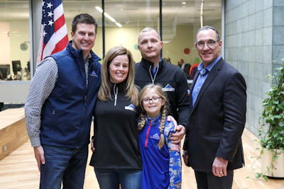 Folds of Honor visits Grainger's headquarters on Wednesday, Nov. 13, in Lake Forest, IL to accept a $100,000 donation that will directly fund 20 scholarships in the amount of $5,000 each to qualified, incoming college freshman who are pursuing degrees in engineering and technology. Pictured (left to right): Ben Leslie, EVP, Folds of Honor; scholarship recipient family Sami Anderson, Skyler Anderson and Army Sergeant Garret Anderson; Joe Boveri, a military Veteran representative from Grainger.
