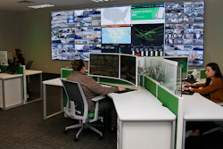Paycom personnel monitor physical and IT security in the command center at the Oklahoma City Paycom campus Monday, Nov. 25, in Oklahoma City. Company officials say they ramped-up security after a disgruntled ex-worker began frightening employees with threatening messages and social media posts.