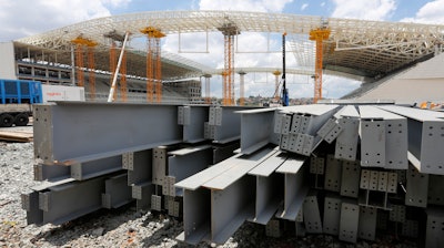 In this Dec. 8, 2013 file photo, steel beams sit outside Arena de Sao Paulo in Sao Paulo, Brazil.