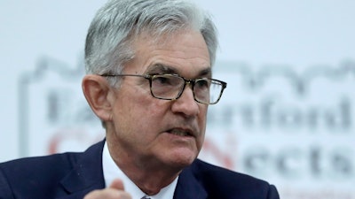 In this Nov. 25, 2019 file photo, Federal Reserve Board Chair Jerome Powell addresses a round table discussion during a visit to Silver Lane Elementary School, in East Hartford, CT.