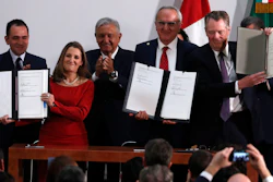Mexico's Treasury Secretary Arturo Herrera, left, Deputy Prime Minister of Canada Chrystia Freeland, second left, Mexico's President Andres Manuel Lopez Obrador, center, Mexico's top trade negotiator Jesus Seade, second right, and U.S. Trade Representative Robert Lighthizer, hold the documents after signing an update to the North American Free Trade Agreement, at the national palace in Mexico City on Tuesday, Dec. 10.