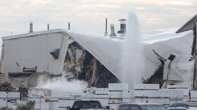 Authorities respond after a partial building collapse at Beechcraft aircraft manufacturing facility in Wichita, KS on Friday, Dec. 27.