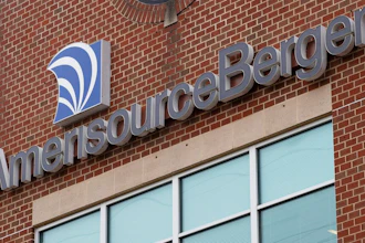 This Oct. 16, 2019 file photos shows an AmerisourceBergen Corp. office building in Conshohocken, Pa. Michigan is suing four companies over the deadly painkiller epidemic. State Attorney General Dana Nessel says Michigan is the first state to sue major opioid distributors under a drug dealer liability law. The suit filed Tuesday, Dec. 17, names AmericsourceBergen, Cardinal Health, McKesson and Walgreens. They have been sued in other states, too.