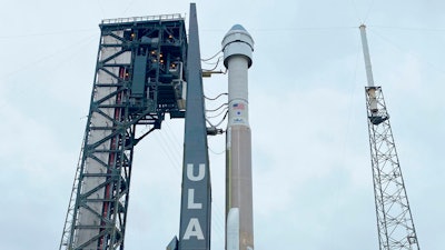 In this photo made available by NASA, Boeing's CST-100 Starliner spacecraft atop a United Launch Alliance Atlas V rocket is rolled out of the Vertical Integration Facility to the launch pad at Space Launch Complex 41 at Cape Canaveral Air Force Station in Florida on Wednesday, Dec. 18, 2019. It is scheduled for liftoff to the International Space Station on Friday.