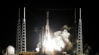 A United Launch Alliance Atlas V rocket carrying the Boeing Starliner crew capsule on an Orbital Flight Test to the International Space Station lifts off from Space Launch Complex 41 at Cape Canaveral Air Force station, Friday, Dec. 20, 2019, in Cape Canaveral, Fla.