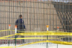 A McAllen K-9 police officer walks past rebar that will make up the border wall before DHS Acting Homeland Secretary Chad Wolf tours and speaks to the local media at the border wall under construction on Thursday, Nov. 21, 2019, south of Donna, Texas.