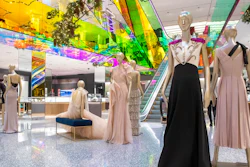 In this Tuesday, Nov. 26, 2019, photo shows a Gucci gown on display in The Vault at the Saks Fifth Avenue Flagship in New York. Millennials and Generation Z accounted for 47% of luxury consumers in 2018 and for 33% of all luxury sales worldwide in 2018, according to a study by consulting firm Bain & Co. Together, however, they contributed to virtually all of the market's growth, compared with 85% in 2017.