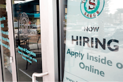 In this Nov. 4, 2019, file photo a job posting is displayed near the entrance outside a restaurant in Orlando, Fla. Two reports last week show that small business hiring still lags behind the strong job growth reported at larger companies, and that owners are unlikely to increase their staffs significantly in 2020.