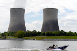 In this April 29, 2015 file photo, a boat travels on the Tennessee River near the Watts Bar Nuclear Plant near Spring City, Tenn. Federal regulators have fined the nation’s largest public utility $145,000 for submitting incomplete and inaccurate information on a backup system at its Watts Bar Nuclear Plant. The Nuclear Regulatory Commission notified the Tennessee Valley Authority of the proposed fine regarding the Spring City, Tennessee plant in a Nov. 19, 2019 letter. The utility says it has taken corrective action, adding that the backup configuration was never used.