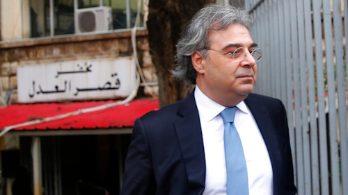 Carlos Abou Jaoude, a lawyer for ex-Nissan chief Carlos Ghosn, leaves the judicial palace where Ghosn was questioned by a Lebanese prosecutor, in Beirut, Lebanon, Thursday, Jan. 9, 2020. Lebanese prosecutors issued a travel ban for fugitive ex-Nissan chief Carlos Ghosn, following an Interpol-issued notice, a judicial official said Thursday.