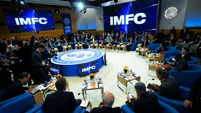 In this Oct. 19, 2019, file photo, members of the International Monetary and Financial Committee (IMFC) meet at the World Bank/IMF Annual Meetings in Washington.