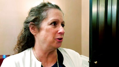 Abigail Disney, granddaughter of Walt Disney Co. co-founder Roy Disney, speaks with reporters at the Capitol in Sacramento, Calif., Wednesday, Jan. 15, 2020. Disney testified before state lawmakers in support of a bill that would raise taxes on some of the country's largest corporations. The size of the tax increase would depend on the gap between what a company pays its CEO versus the average salary for employees. The larger the gap, the higher the tax increase.