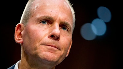 In this Oct. 29, 2019, file photo Boeing Company President and Chief Executive Officer Dennis Muilenburg appears before a Senate Committee on Commerce, Science, and Transportation hearing on 'Aviation Safety and the Future of Boeing's 737 MAX' on Capitol Hill in Washington.