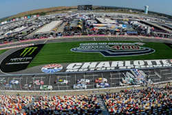 In this Sept. 28, 2019, file photo Chase Briscoe (98) leads the field of cars to start the NASCAR Xfinity Series auto race at Charlotte Motor Speedway in Concord, N.C. General Motors is planning to open a new technical center for performance and auto racing near the Charlotte Motor Speedway. The center will focus on transferring auto racing knowledge into engineering for vehicles that are sold to the public.