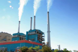 In this July 1, 2013, file photo, gas emissions rises from a coal-burning power plant in Colstrip, Mont. One of the largest coal-fired power plants in the western U.S. will close two of its four units by Saturday, Jan. 4, 2020, as the Montana facility edges toward an eventual total shutdown.