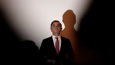 Nissan's former chairman Carlos Ghosn arrives for a press conference in Beirut, Lebanon, Wednesday, Jan. 8, 2020.