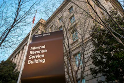 This April 13, 2014, file photo, shows the Internal Revenue Service headquarters building in Washington. A federal judge says it's likely that Microsoft was trying to avoid or evade paying U.S. taxes and is ordering the company to hand over financial documents from more than a decade ago.