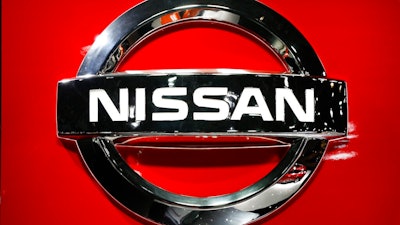 In this Jan. 14, 2019, file photo, a Nissan logo is shown at the North American International Auto Show in Detroit. Slumping Nissan Motor Co. is offering voluntary separation packages to many of its U.S. workers as it tries to resize itself to match lower sales. Eligible workers will be notified by Friday, Jan. 31, 2020, and would leave later in the year.