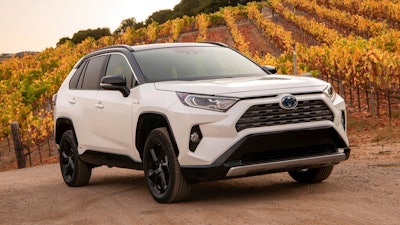 This undated photo provided by Toyota shows the 2020 RAV4 Hybrid, a compact SUV with an EPA-estimated 40 mpg in mixed driving.