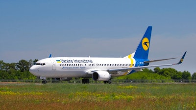 In this photo taken on Saturday, May 26, 2018, showing the actual Ukrainian Boeing 737-800 UR-PSR plane that crashed Wednesday Jan. 8, 2020, on the outskirts of Tehran, Iran, seen here as it waits to takeoff at Borispil international airport outside Kyiv, Ukraine. This Ukrainian airplane carrying 176 people crashed on Wednesday shortly after takeoff from Tehran's main airport, killing all onboard, Iranian state TV and officials in Ukraine said.