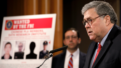Attorney General William Barr speaks during a news conference, Monday, Feb. 10, 2020, at the Justice Department in Washington, as Principal Associate Deputy Attorney General Seth Ducharm looks on.