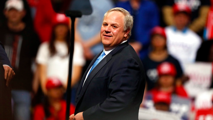 In this Feb. 20, 2020, file photo Interior Secretary David Bernhardt joins President Donald Trump as he speaks at a campaign rally in Colorado Springs, Colo. The Trump administration moved Thursday on a water-recycling push it says could get good use out of more of the wastewater that industries, cities and farms spew out, including the billions of barrels of watery waste generated by oil and gas fields each year.