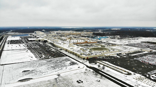 In this Nov. 28, 2018, file photo, snow covers the perimeter of the General Motors' Lordstown plant, in Lordstown, Ohio. The Trump administration’s budget proposal scraps a loan program that could help an upstart electric vehicle company’s plans to reuse the now-closed General Motors factory in Lordstown, Ohio.