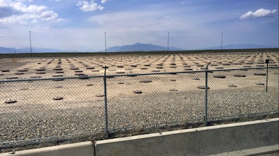 In this May 11, 2015 file photo, nuclear waste is stored in underground containers at the Idaho National Laboratory near Idaho Falls, Idaho. A nuclear test reactor in Idaho that develops fuel for the nation's fleet of nuclear-powered warships among other tasks will remain operating.