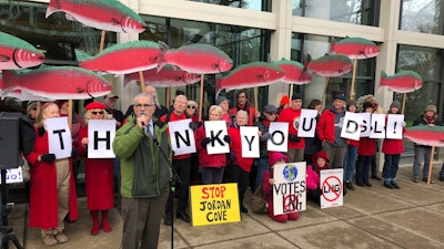 Oregon state Sen. Jeff Golden speaks to demonstrators opposed to a plan to build a natural gas pipeline and marine export terminal in Oregon, at the Department of State Lands in Salem, Ore., Tuesday, Feb. 4, 2020.