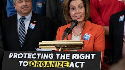 Speaker of the House Nancy Pelosi, D-Calif., joined at left by AFL-CIO President Richard Trumka, speaks during a news conference about the Protecting the Right to Organize (PRO) Act at the Capitol in Washington, Wednesday, Feb. 5, 2020. (AP Photo/J. Scott Applewhite)
