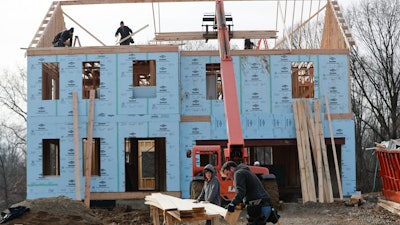 In this Jan. 4, 2019 file photo, work continues on a plan of new homes in Franklin Park, PA. U.S. productivity rebounded in the final three months of 2019, helping to boost productivity growth for the year to the best showing in nearly a decade.