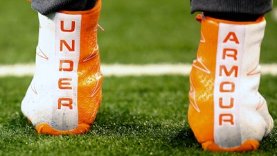 This March 5, 2017, file photo shows a closeup of Under Armour cleats seen before a drill at the 2017 NFL football scouting combine in Indianapolis.