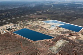 This April 11, 2015, photo provided by EcoFlight shows the White Mesa Uranium Mill near Blanding in southeastern Utah.