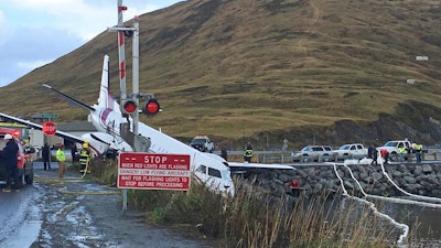 This Oct. 17, 2019, file photo, shows a commuter airplane that crashed near the airport in Unalaska, Alaska, killing a passenger. Alaska needs a comprehensive review effort to improve aviation safety because its aviation fatal and non fatal accident rates are far higher than the national average, the National Transportation Safety Board said Thursday, Feb. 20, 2020.