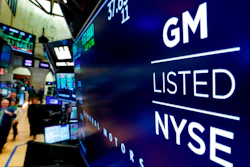 In this April 23, 2018, file photo, the logo for General Motors appears above a trading post on the floor of the New York Stock Exchange. Despite a 40-day strike by factory workers and slumping sales in the U.S. and China, General Motors still made money in 2019. The company posted a $6.58 billion profit for the year, but that was down almost 17% from 2018.