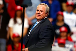 In this Feb. 20, 2020, file photo Interior Secretary David Bernhardt joins President Donald Trump as he speaks at a campaign rally in Colorado Springs, Colo. The Trump administration moved Thursday on a water-recycling push it says could get good use out of more of the wastewater that industries, cities and farms spew out, including the billions of barrels of watery waste generated by oil and gas fields each year.