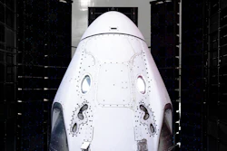 This undated photo made available by SpaceX in February 2020 shows the Crew Dragon spacecraft undergoing acoustic testing in Florida. On Tuesday, Feb. 18, 2020, SpaceX announced it is working with Space Adventures Inc. to take tourists into a high orbit. Ticket prices aren't being divulged but are likely to be in the millions of dollars.