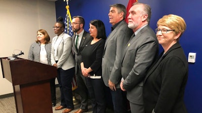 LGBT advocacy group leaders and representatives from businesses gathered at the Cordell Hull legislative building in Nashville on Wednesday, Feb. 5, 2020 for a news conference to oppose a state adoption law and other proposals that target the LGBT community. Almost three dozen big companies and more than 100 small businesses in Tennessee on Wednesday predicted economic backlash from a newly enacted state adoption law and other proposals that target LGBT people, with one company saying plans to add jobs in Nashville are 'in doubt' over the legislation.