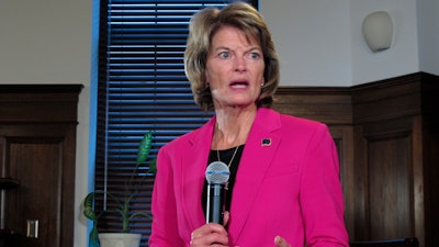 U.S. Sen. Lisa Murkowski speaks with reporters after delivering an annual speech to a joint session of the Alaska Legislature on Tuesday, Feb. 18, 2020, in Juneau, Alaska.