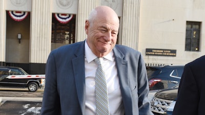 UAW official Edward Robinson leaves federal court in Detroit, Monday, March 2, 2020.