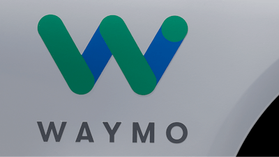 In this May 8, 2018, file photo, a Waymo logo is displayed on the door of a car at the Google I/O conference in Mountain View, Calif.