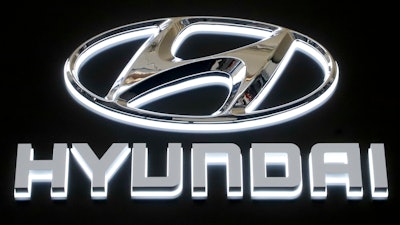 In this Feb. 14, 2019 file photo, this is the Hyundai logo on a sign at the 2019 Pittsburgh International Auto Show in Pittsburgh.