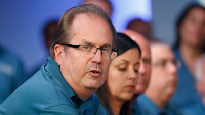 In this July 16, 2019, file photo, Gary Jones, United Auto Workers President, speaks during the opening of their contract talks with Fiat Chrysler Automobiles in Auburn Hills, Mich.