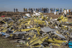In this March 11, 2019, file photo, wreckage is piled at the crash scene of Ethiopian Airlines flight ET302 near Bishoftu, Ethiopia.