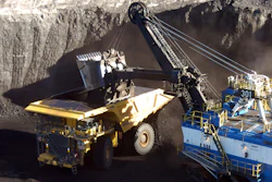 In this Nov. 15, 2016, file photo, a mechanized shovel loads coal from an 80-feet thick seam at the Spring Creek mine near Decker, Mont.