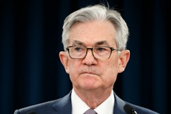 Federal Reserve Chair Jerome Powell pauses during a news conference in Washington.