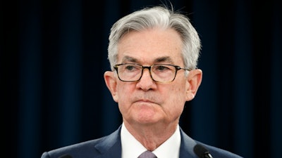 Federal Reserve Chair Jerome Powell pauses during a news conference in Washington.