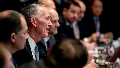 Gilead Sciences CEO Daniel O'Day speaks at a meeting with President Donald Trump, members of the Coronavirus Task Force, and pharmaceutical executives in the Cabinet Room of the White House in Washington.